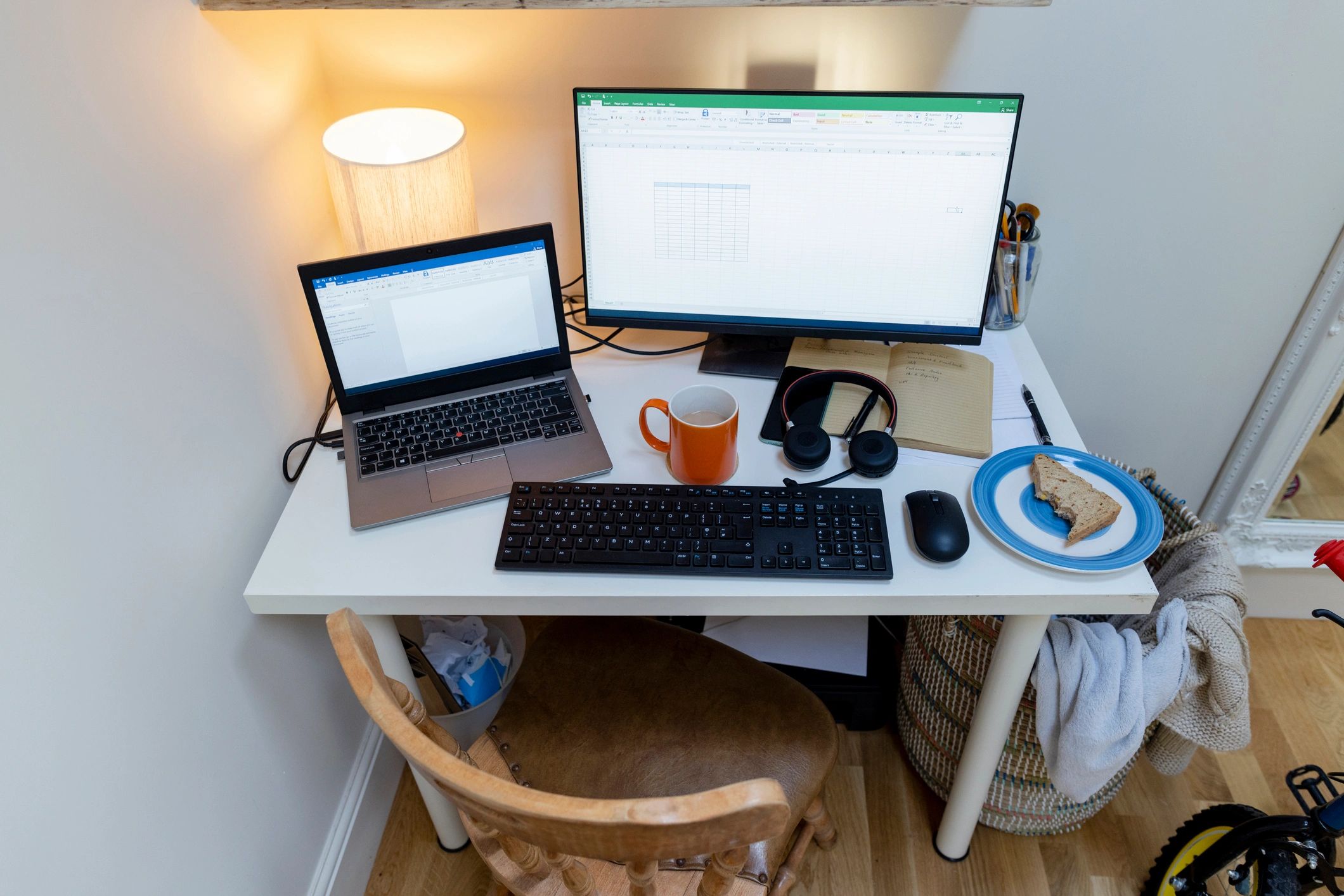 Dark tech workspace with dual monitors and desk setup