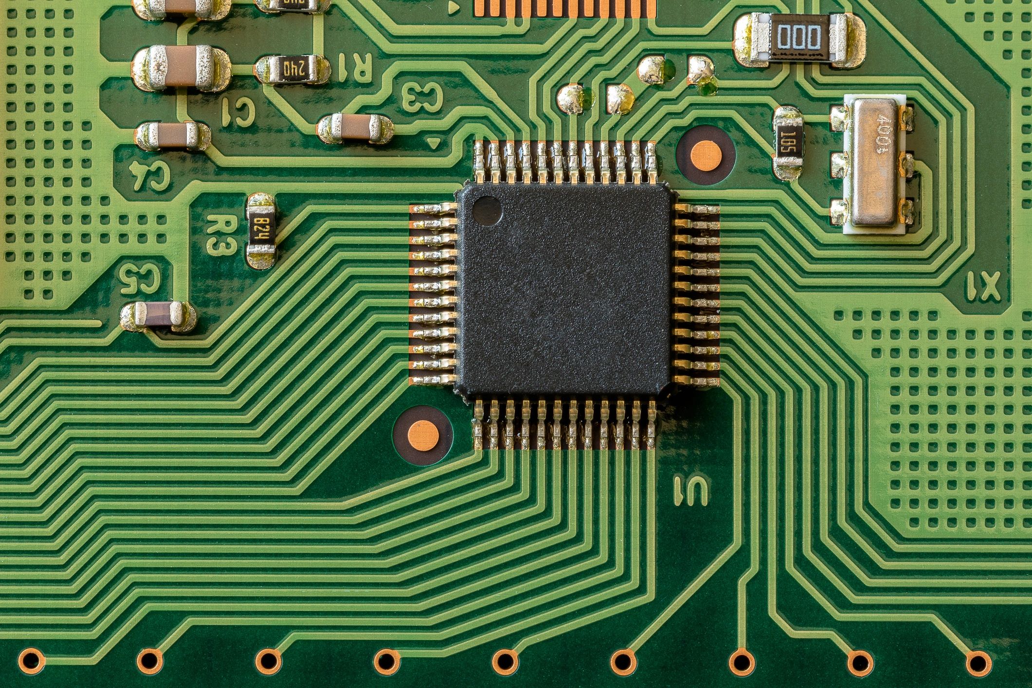 Top-down view of a computer chip on a dark surface