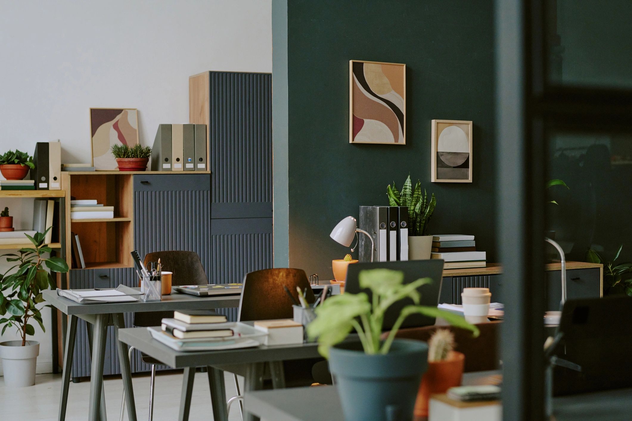 Minimal modern workspace with laptop-ready desks